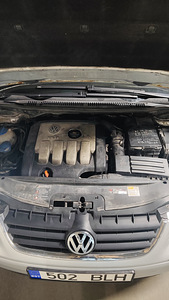 Volkswagen Touran 1T 2.0 tdi 103Kw (13 фото из 14)