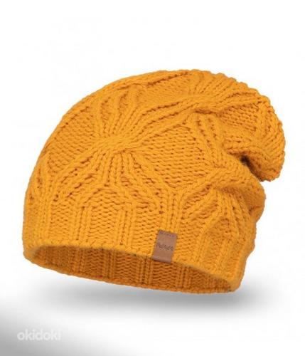 Теплая и модная зимняя шапка для женщин (фото #3)