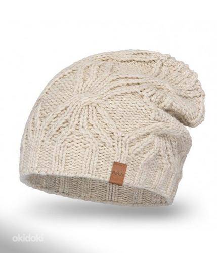 Теплая и мягкая зимняя шапка для женщин (фото #1)