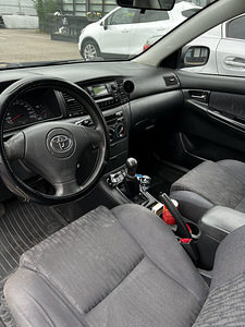 Toyota Corolla 2003 1.4 71 Kw Bensiin (5 foto / 11)