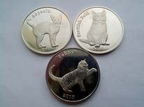Красивые и редкие монеты Кошки Шотландии
