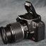 Canon EOS 1000D + 18-55 мм + зарядное устройство + оригинальная коробка (фото #1)