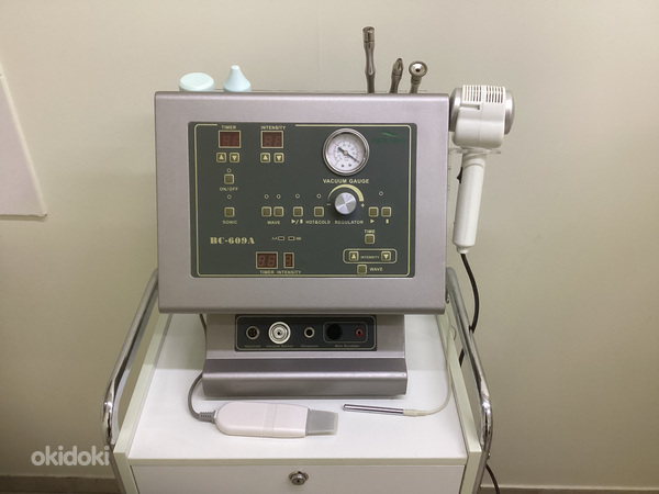 Косметический многофункциональный аппарат для ухода за лицом и телом (фото #1)