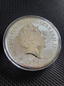 1 kg hõbemünt (2x Austraalia, 1x UK, 1x Cooki saared) (7 foto / 9)