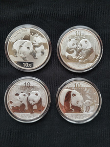 Коллекция серебряных монет Китайская панда 2008-2024