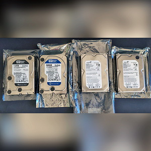 4 внутренних жестких диска SATA II, 1000+500+500+320 ГБ (1 фото из 5)