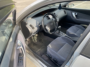 Nissan Primera (5 foto / 6)
