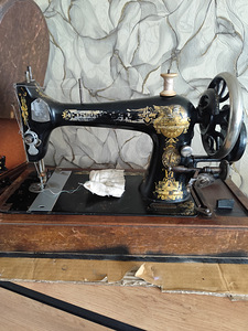 Singeri õmblusmasin aastast 1911 (3 foto / 10)