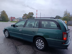 Opel Omega tagavedu manuaal ÜV 07.2025a (12 foto / 15)