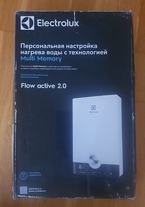 Проточный водонагреватель (3 фото из 4)