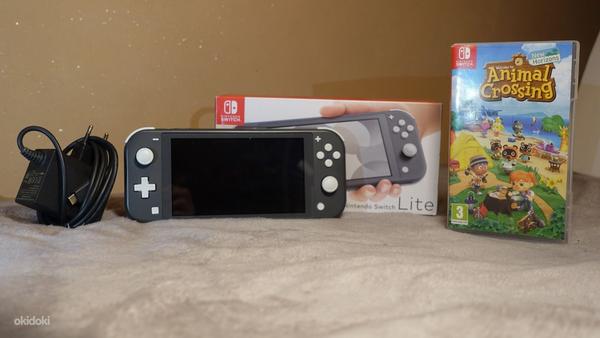 Nintendo Switch Lite + Animal Crossing New Horizons (foto #1)