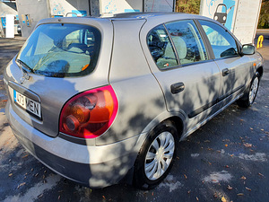 Nissan Almera N16 (4 foto / 15)