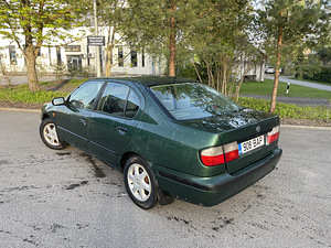 Nissan Primera (4 foto / 9)
