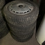 Шипованная резина с железными дисками на Audi a4 (фото #1)