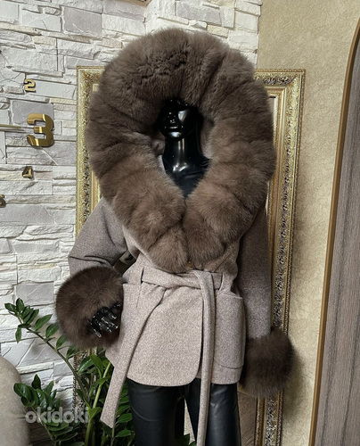 Polsterdatud mantel