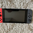Продам Nintendo Switch + 8 игр + карта памяти 32 ГБ и чехол (фото #1)