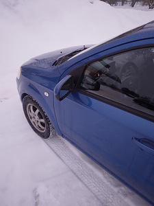 Chevrolet Aveo (9 фото из 11)