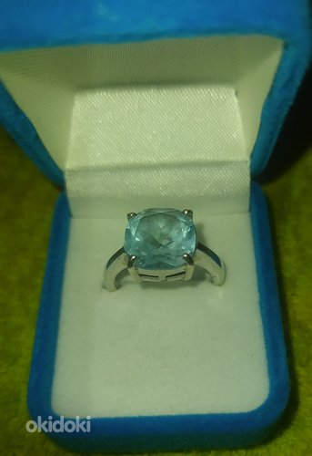 Продам серебряное кольцо с топазом
