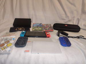 Nintendo Switch OLED+Чехол+Игры+Подарок (3 фото из 4)