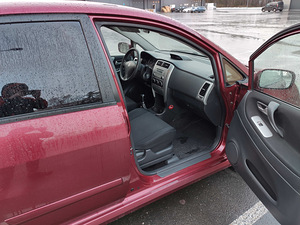 Suzuki Liana (6 foto / 15)