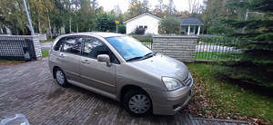 Suzuki liana 2007 бензин (5 фото из 9)
